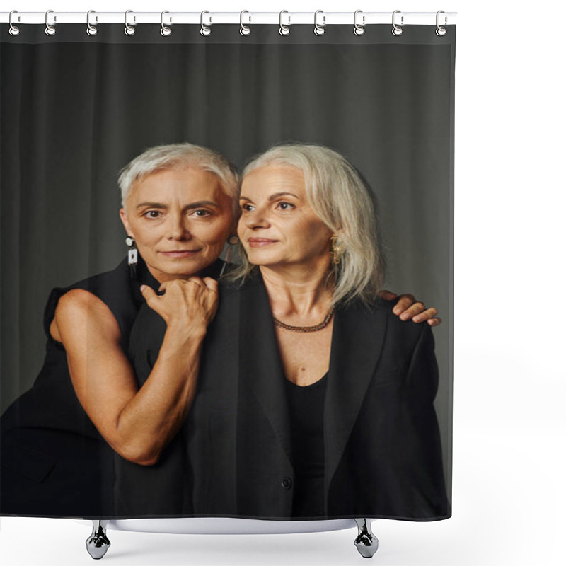 Personality  Elegant Senior Lady In Black Attire Hugging Shoulders Of Female Friend And Looking At Camera On Grey Shower Curtains