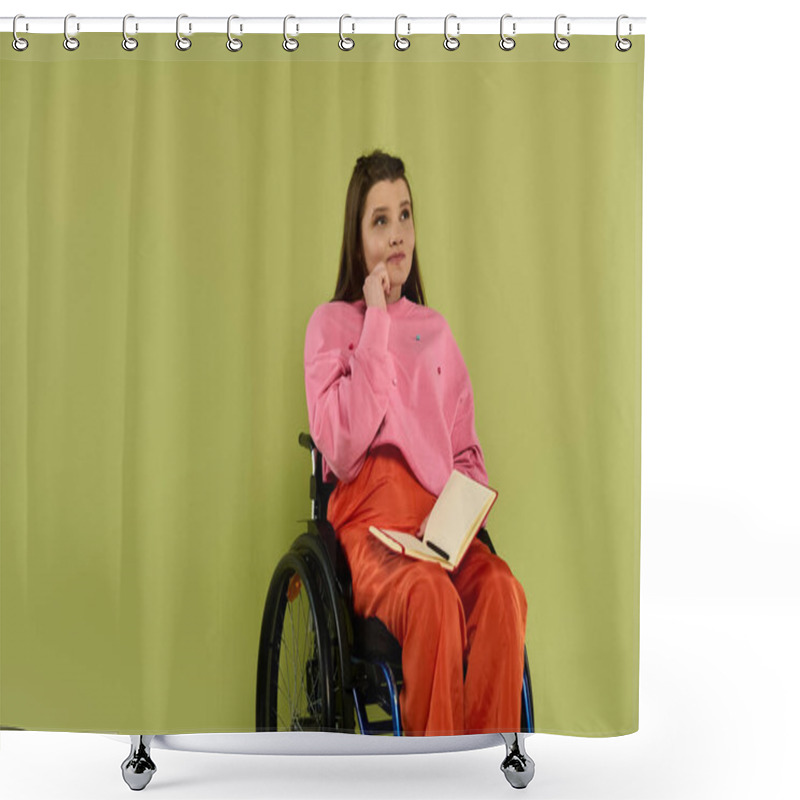 Personality  A Brunette Woman Sits In A Wheelchair In A Studio Setting, Thoughtfully Looking Off To The Side. She Is Dressed Casually In A Pink Sweater And Orange Pants. Shower Curtains