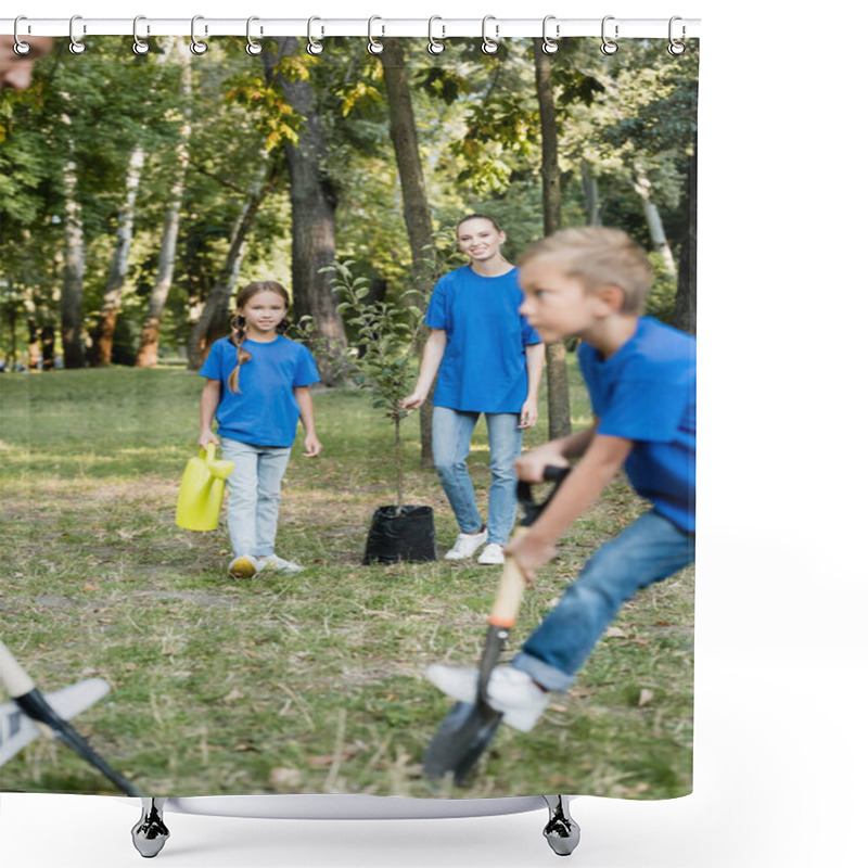 Personality  Woman With Young Tree And Daughter With Watering Can Near Boy Digging Ground With Shovel On Blurred Foreground, Ecology Concept Shower Curtains