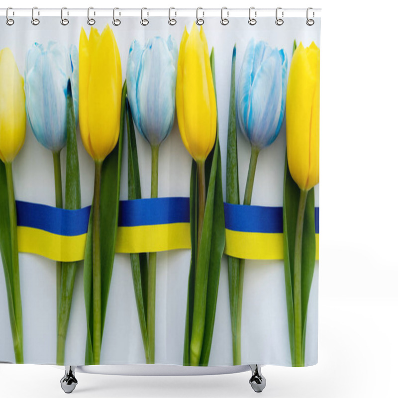 Personality  Top View Of Tulips Near Blue And Yellow Ribbon On White Background  Shower Curtains