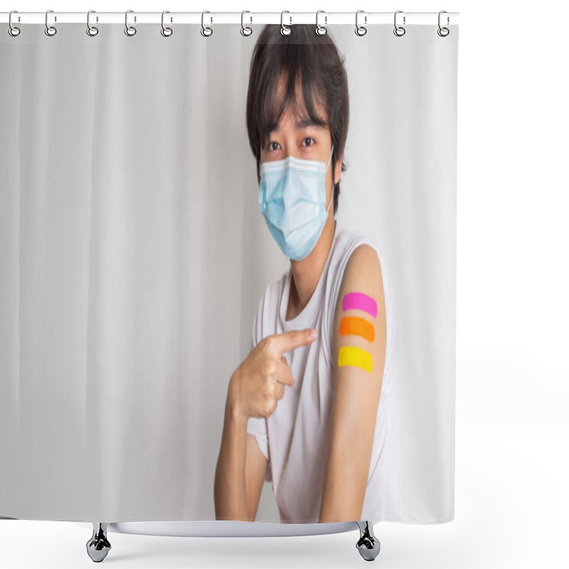 Personality  Asian Man Wearing Face Mask With A Smile On His Face Showing His Vaccinated Arm. Fight Against Virus Covid-19 Coronavirus, Vaccination And Immunization. Vaccine Booster Concept. Shower Curtains