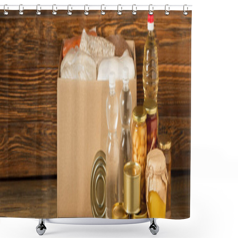 Personality  Panoramic Shot Of Cardboard Box With Groats Near Water, Oil, Canned Food And Honey On Wooden Background, Charity Concept Shower Curtains