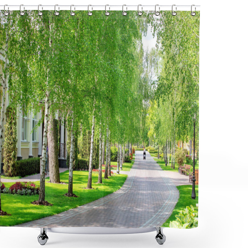 Personality  A Tranquil Path Framed By Lush Green Trees Provides A Peaceful Escape For Walkers. The Sun Casts A Warm Glow, Enhancing The Inviting Atmosphere Of This Beautiful Park Setting. Shower Curtains