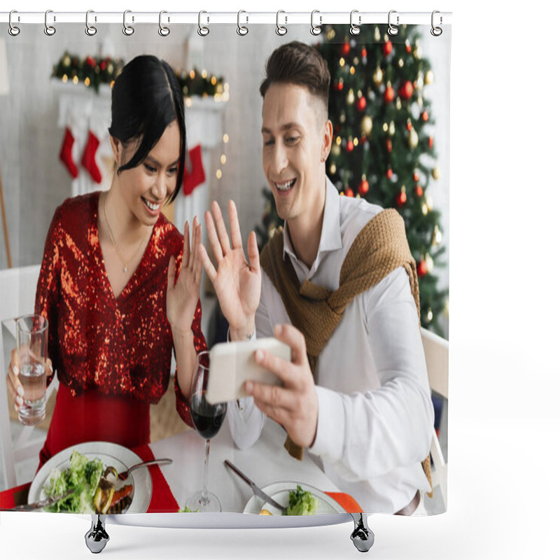 Personality  Pregnant Asian Woman With Smiling Husband Waving Hands During Video Call On Smartphone At Christmas Celebration Shower Curtains