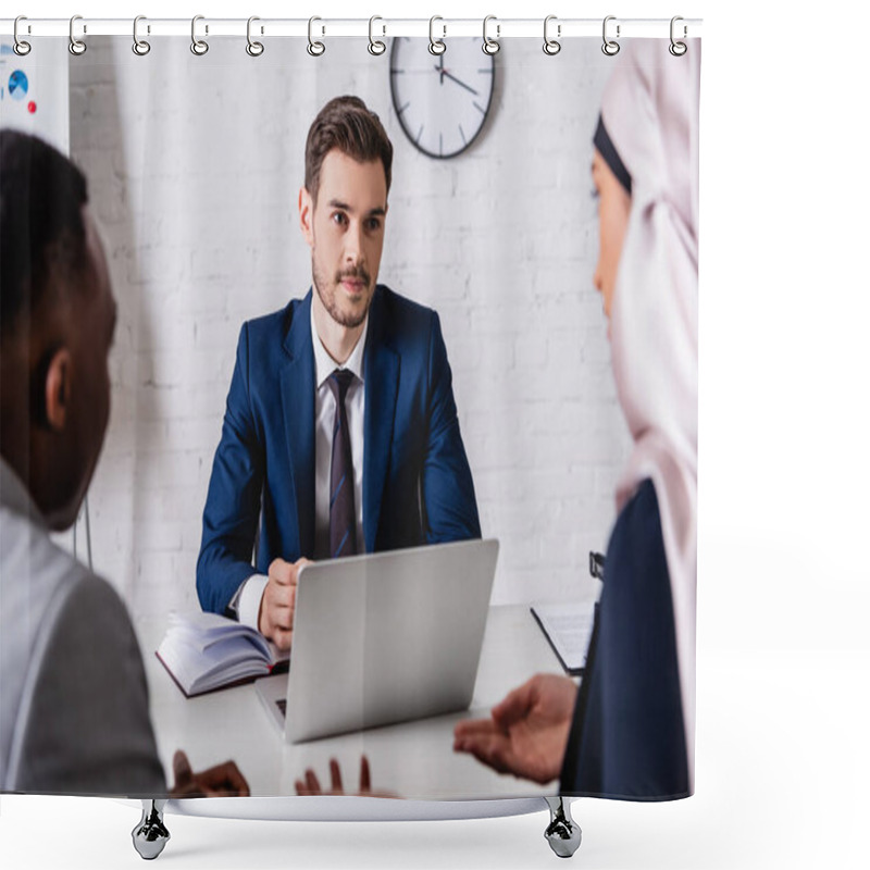 Personality  European Translator Sitting Near Laptop And Looking At Arabian And African American Business Partners, Blurred Foreground Shower Curtains