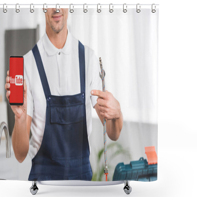 Personality  Cropped View Of Smiling Adult Repairman Holding Smartphone And Pointing With Finger At Screen With Youtube App  Shower Curtains