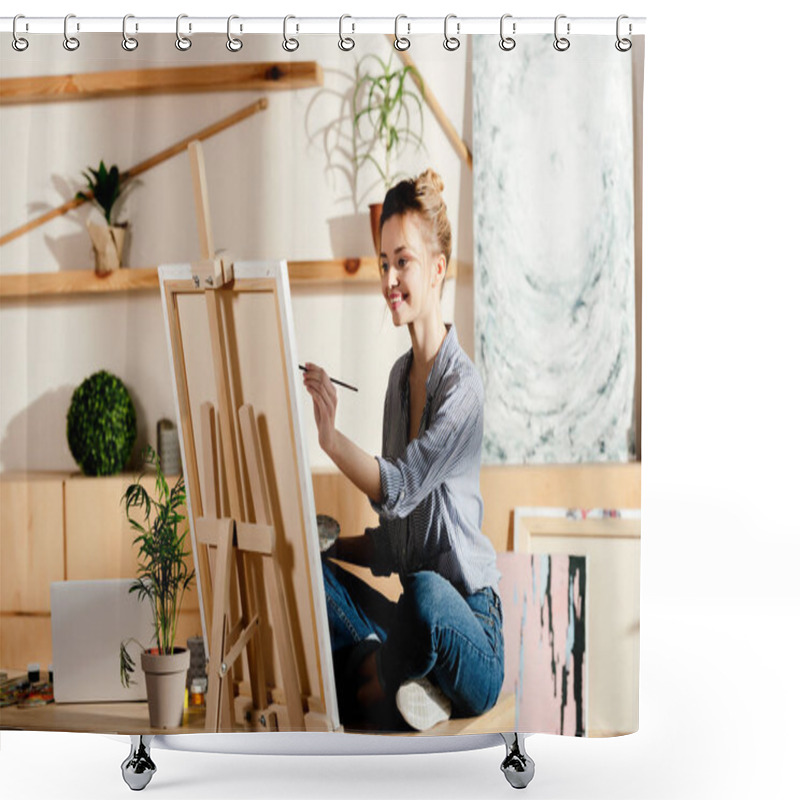 Personality  Smiling Female Artist Sitting On Table And Drawing On Canvas In Studio Shower Curtains