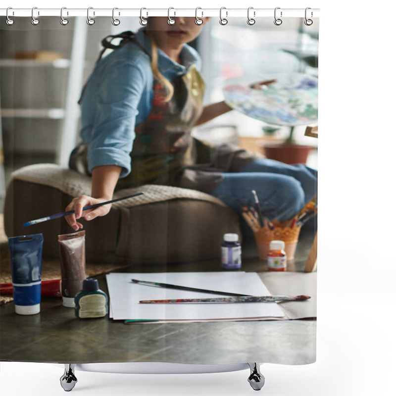 Personality  A Young Woman In An Apron Paints With A Brush In Her Hand In A Workshop Setting. Shower Curtains