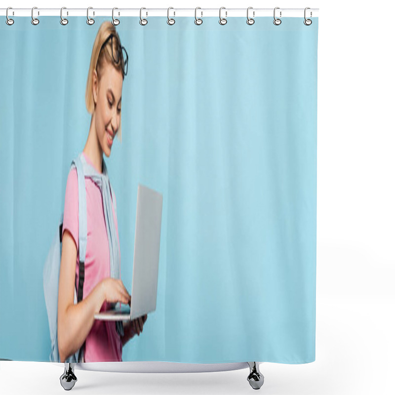 Personality  Panoramic Concept Of Young Blonde Student With Backpack Using Laptop Isolated On Blue Shower Curtains