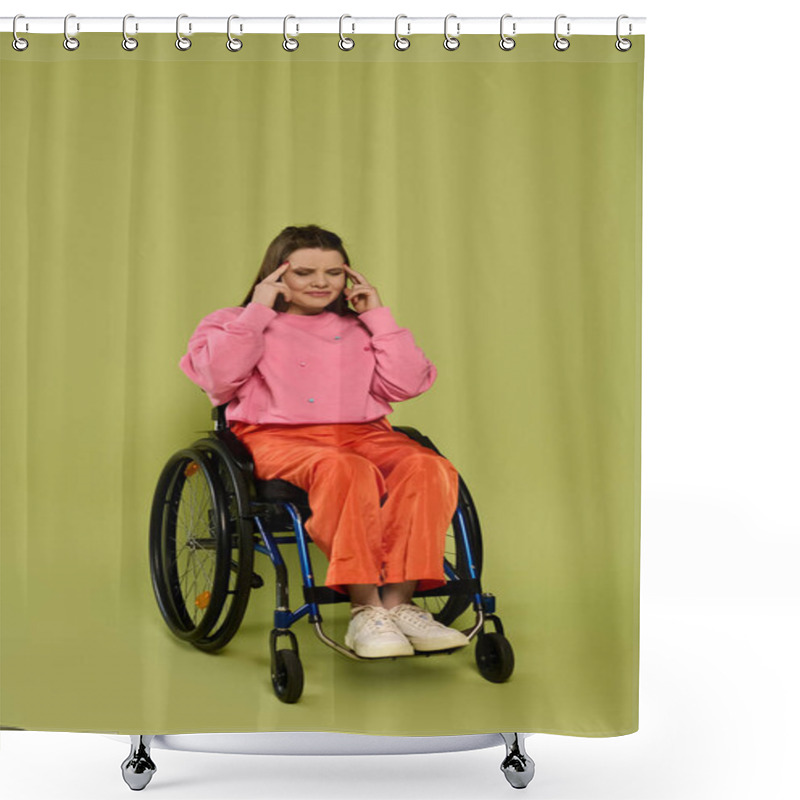 Personality  A Young Brunette Woman In A Wheelchair Sits In A Studio Setting With A Green Background. She Wears A Pink Sweater And Orange Pants. Shower Curtains