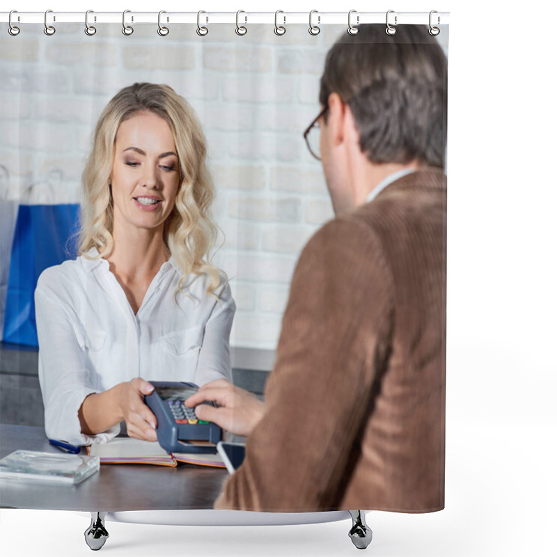 Personality  Smiling Female Seller Holding Payment Terminal And Customer Entering Pin Code In Shop Shower Curtains