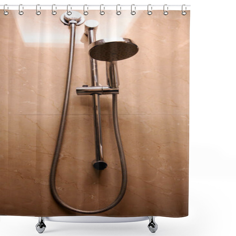 Personality  A Modern Shower Head Is Featured Alongside Brown-orange Wall Tiles In The Bathroom. The Simple, Stylish Design Promotes A Clean And Fresh Atmosphere. Shower Curtains