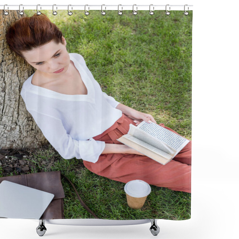 Personality  High Angle View Of Beautiful Young Woman With Book Leaning Back On Tree Trunk In Park Shower Curtains