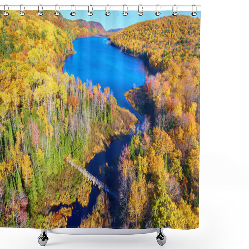 Personality  Aerial View Of A Vibrant Autumn Landscape With A Wooden Footbridge Over A Winding River, Captured In Lake In The Clouds, Michigan, 2017. Shower Curtains