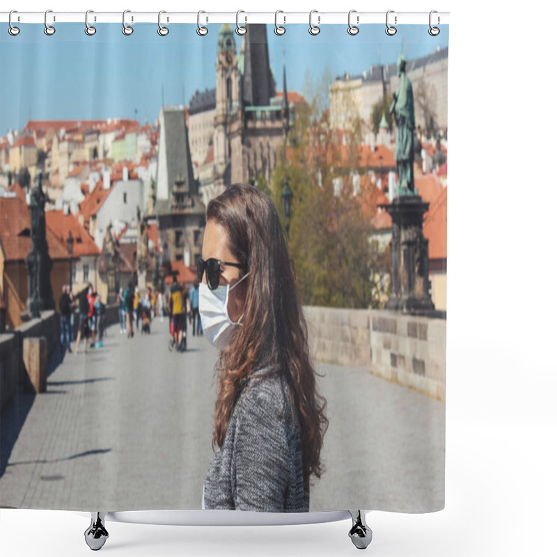 Personality  Young woman with sunglasses and medical face mask photographed on the Charles Bridge in Prague, Czech Republic. Blurred old town in the background. Travelling, tourism during coronavirus. COVID-19. shower curtains