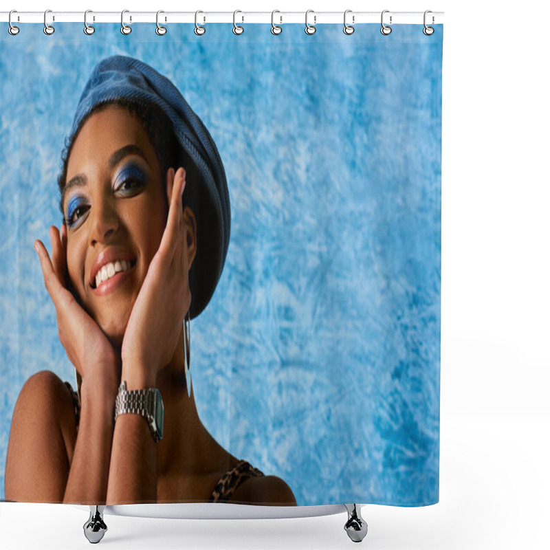 Personality  Low Angle View Of Joyful African American Woman With Bold Makeup And Beret Touching Cheeks And Looking At Camera On Blue Textured Background, Stylish Denim Attire Shower Curtains