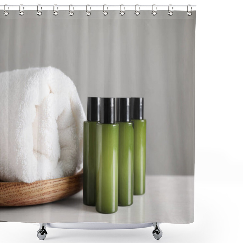 Personality  Mini Bottles With Cosmetic Products And Towel On White Table Against Grey Background Shower Curtains