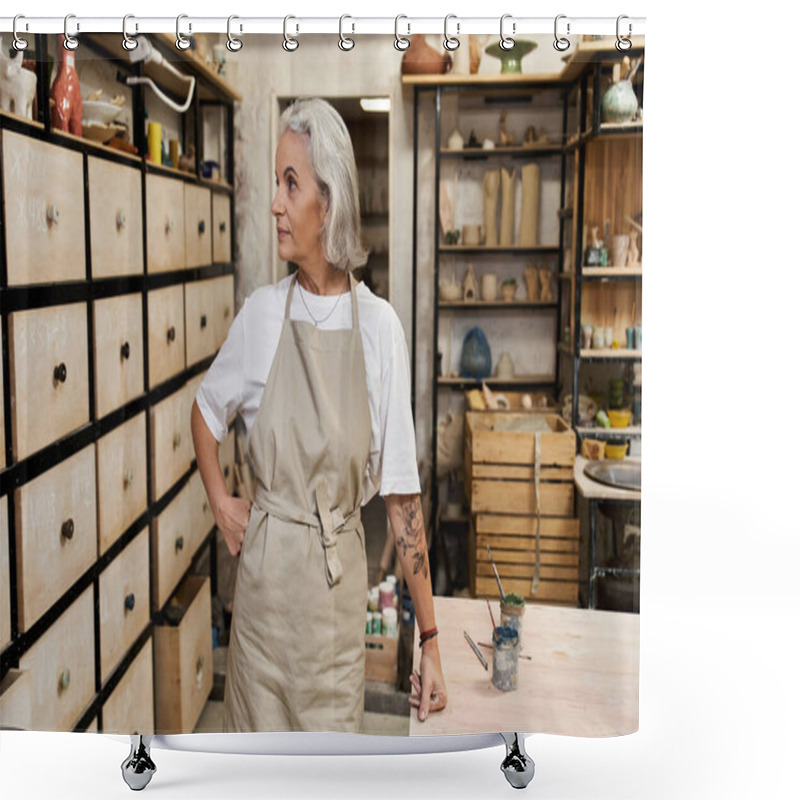 Personality  The Mature Woman, Dressed In An Apron, Prepares To Begin Her Creative Work In A Serene Studio. Shower Curtains