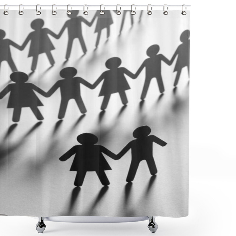 Personality  Black Paper Figure Of A Couple In Front Of A Crowd Of Paper People Holding Hands On White Surface. Social Movement, Leadership, Protest Concept. Shower Curtains