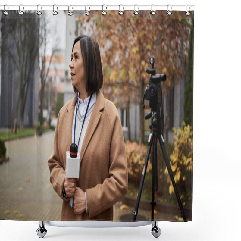 Personality  A Multiracial Journalist Wearing A Beige Coat Stands Outdoors With A Microphone, Preparing To Share News Updates. Shower Curtains