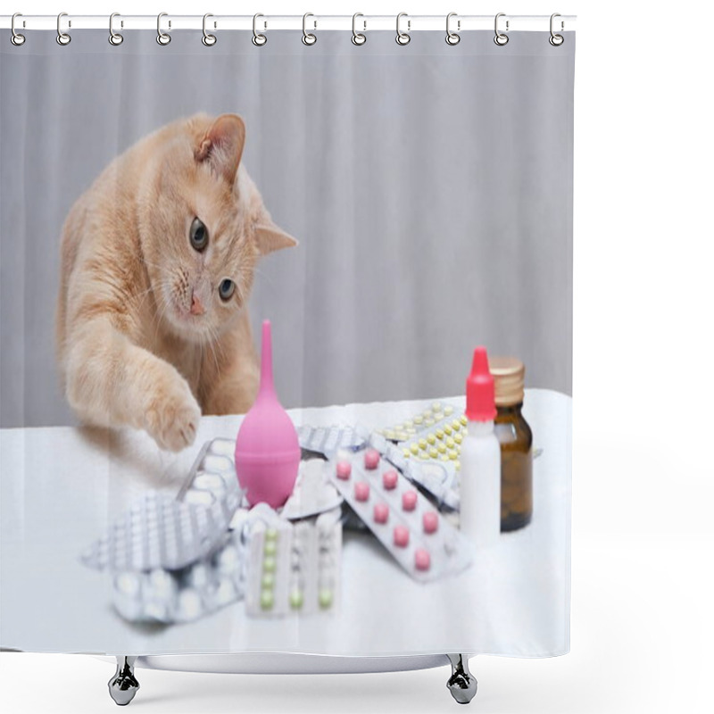 Personality  A Red-haired Cat Sitting In Front Of A Pile Of Medicines And Playing With A Rubber Medical Enema. Pet Treatment Concept. Shower Curtains