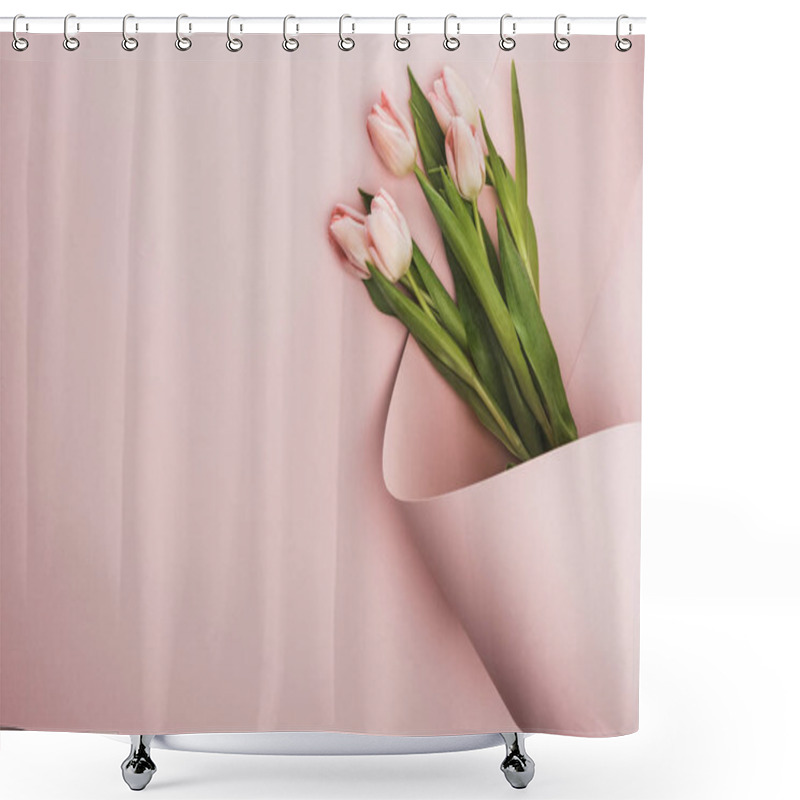 Personality  Top View Of Tulip Bouquet Wrapped In Paper Swirl On Pink Background Shower Curtains