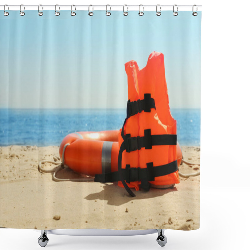 Personality  Orange Life Jacket And Buoy On Sandy Beach Near Sea. Emergency Rescue Equipment Shower Curtains