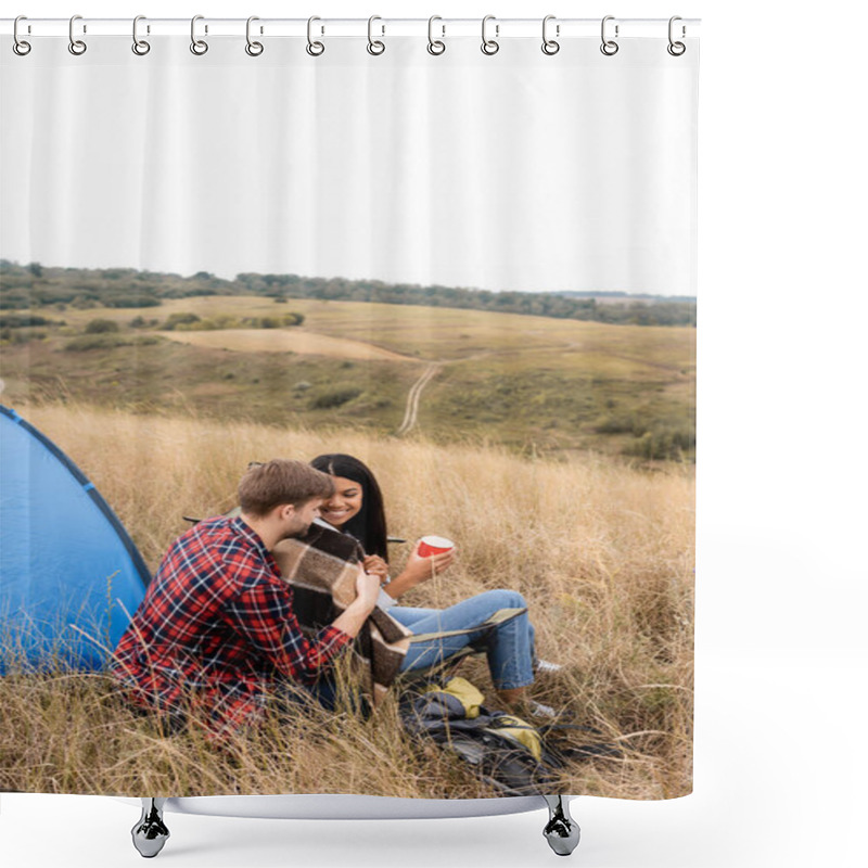 Personality  Multiethnic Couple With Blanket And Cup Sitting Near Backpack And Tent On Field  Shower Curtains