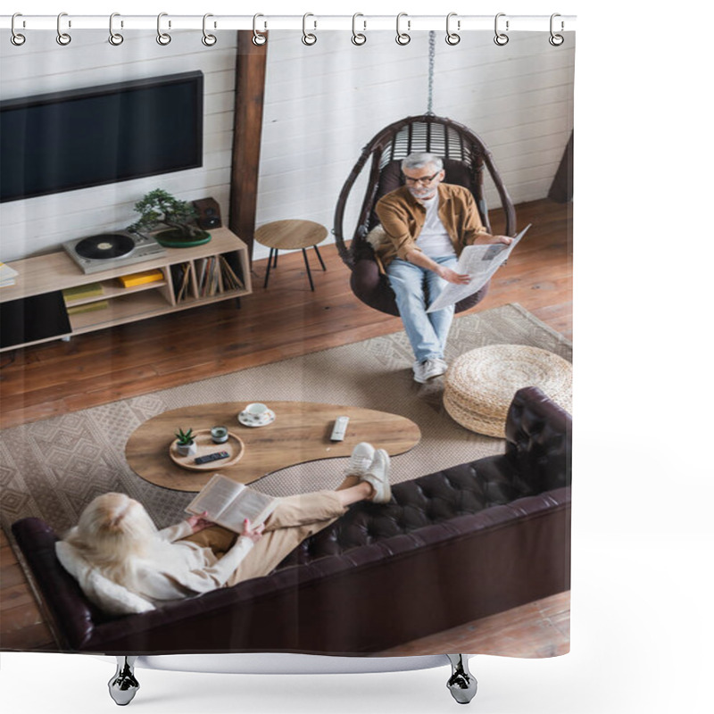 Personality  Overhead View Of Man Pointing At Newspaper Near Senior Wife With Book In Living Room  Shower Curtains