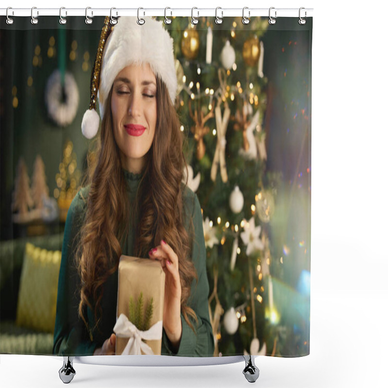 Personality  Christmas Time. Happy Stylish 40 Years Old Housewife With Santa Hat And Eco Packaged Present Box In Green Dress Near Christmas Tree At Modern Home. Shower Curtains