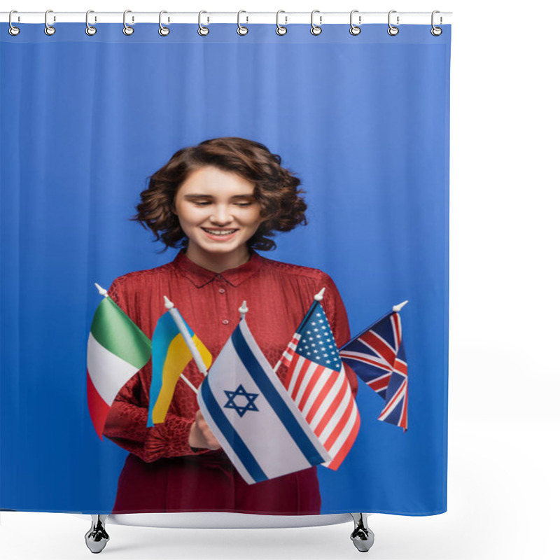 Personality  Happy Woman With Wavy Brunette Hair Looking At International Flags Isolated On Blue Shower Curtains