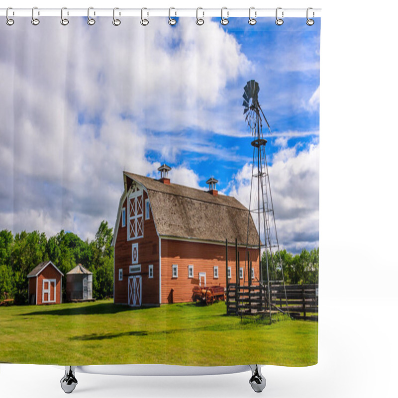 Personality  A Red Barn With A Windmill On Top Stands In A Field. The Barn Is Surrounded By A Fence And A Few Trees. The Sky Is Cloudy, But The Sun Is Still Shining Through The Clouds Shower Curtains