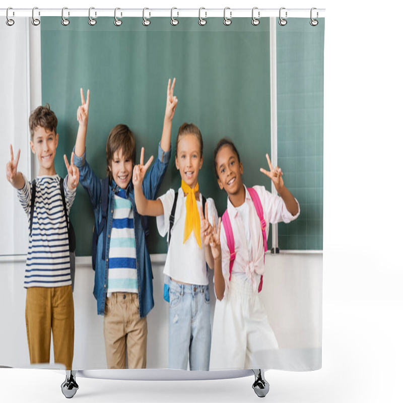 Personality  Selective Focus Of Multiethnic Schoolkids Showing Victory Sign At Camera Near Chalkboard In Classroom  Shower Curtains