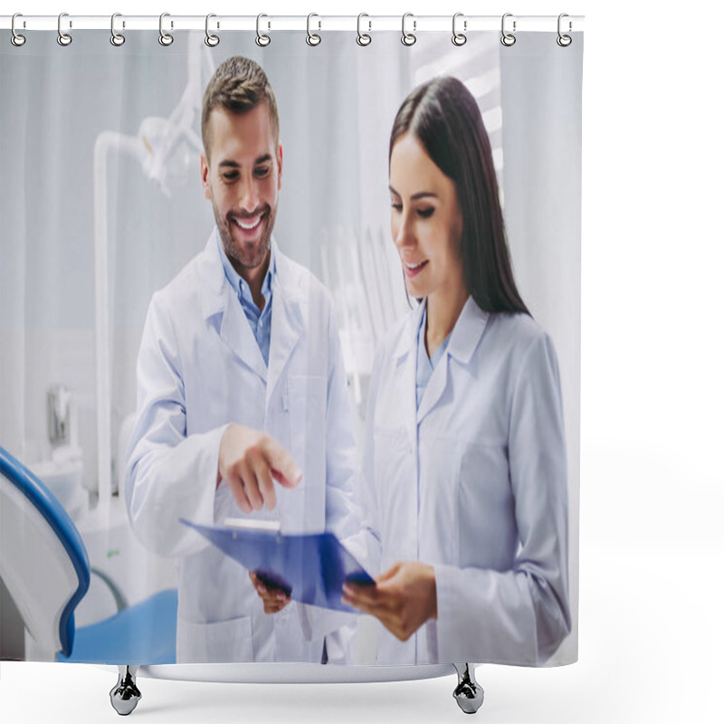 Personality  Portrait Of Smiling Dentist And Assistant Looking At Clipboard In Modern Dental Clinic Shower Curtains