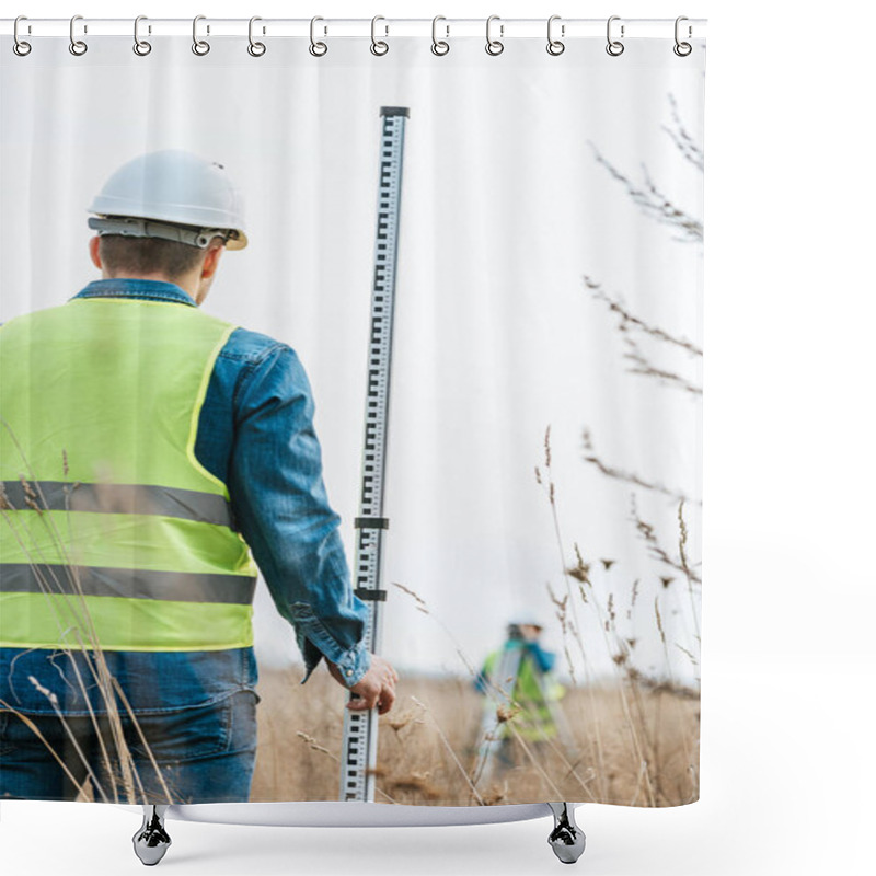 Personality  Selective Focus Of Surveyor With Ruler And Colleague With Digital Level In Field Shower Curtains