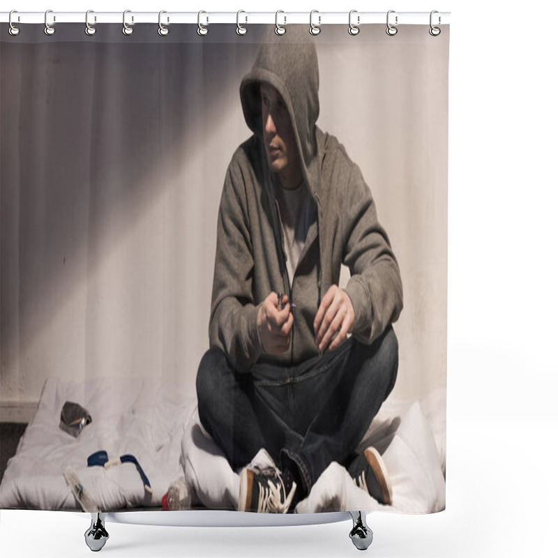 Personality  Addictive Man In Hoodie Holding Smoking Pipe While Sitting On Mattress In Dark Room Shower Curtains