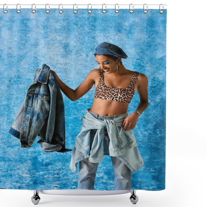 Personality  Smiling African American Woman In Beret, Top With Leopard Print And Jeans Holding Denim Jacket While Standing On Blue Textured Background, Stylish Denim Attire Shower Curtains