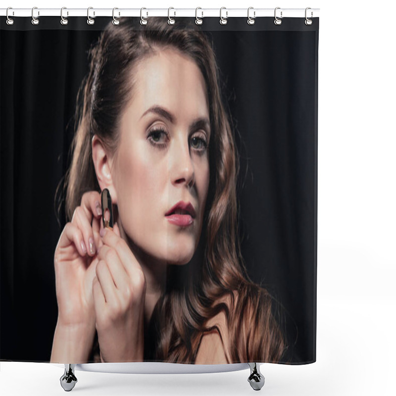 Personality  Beautiful Woman Looking At Camera And Putting On Earring Isolated On Black Shower Curtains