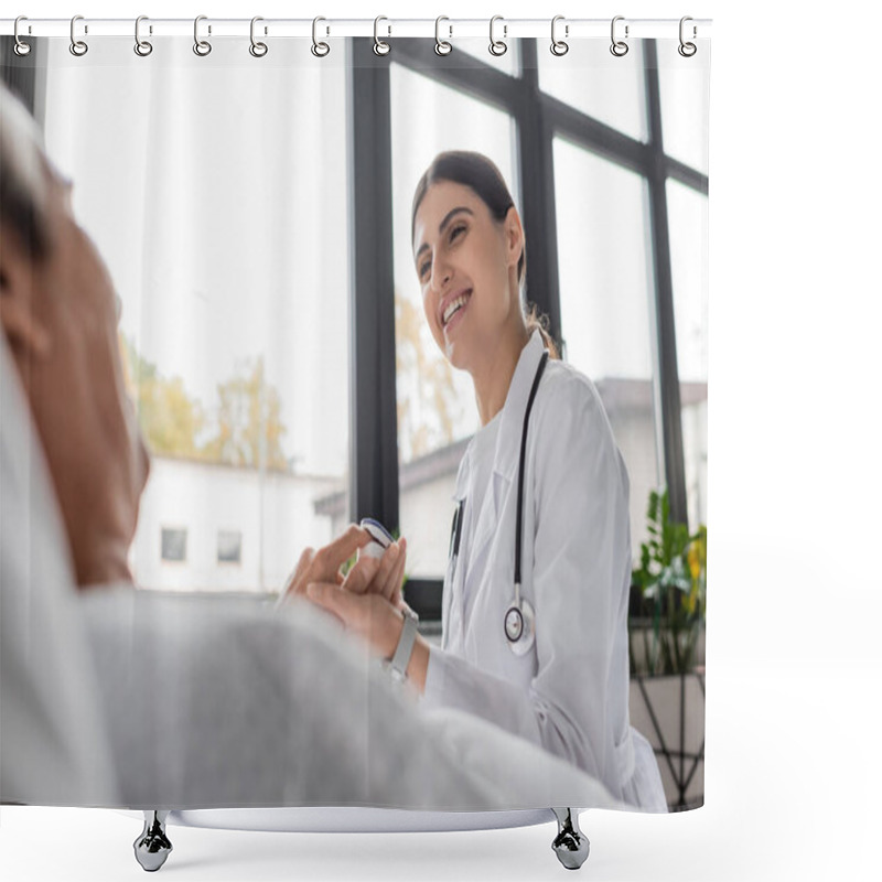 Personality  Cheerful Doctor Wearing Pulse Oximeter On Finger Of Blurred Patient In Clinic  Shower Curtains