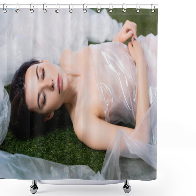 Personality  Young Woman Wrapped In Polyethylene Lying On Grass, Ecology Concept  Shower Curtains