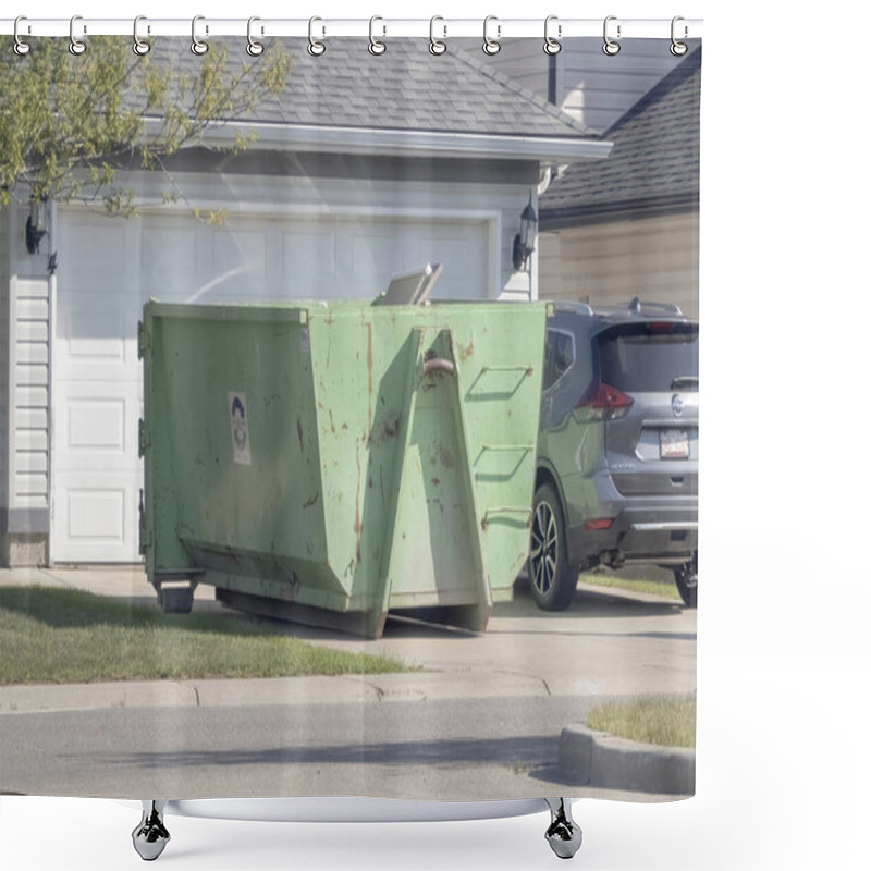 Personality  Calgary, Alberta, Canada. Aug 25, 2023. Construction Rental Dirt Bin, Dumpster Outside Single Family Home, Utilized For Waste Or Recycling. Summer Daylight Setting. Versatile Stock Photo. Shower Curtains