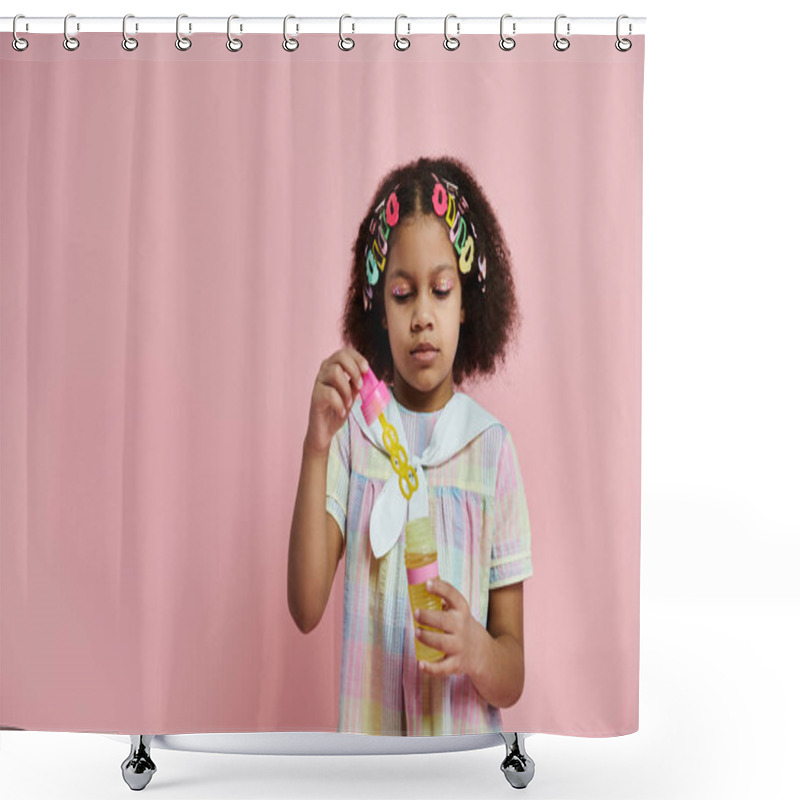 Personality  A Cute African American Girl In A Pink And White Dress And Colorful Hair Clips Holds A Bottle In Her Hand. Shower Curtains