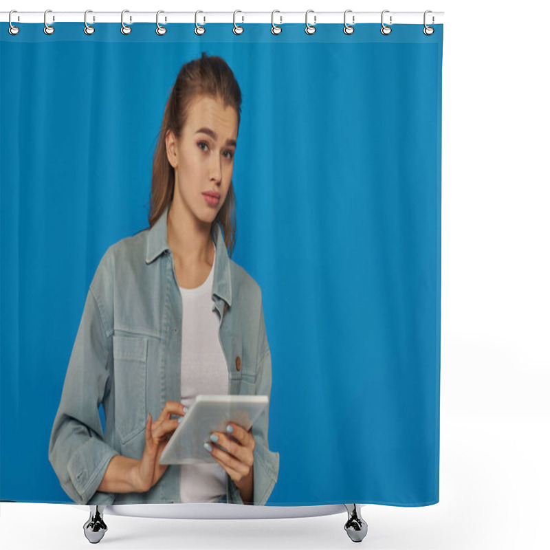 Personality  Beautiful Young Woman Holding Digital Tablet And Looking At Camera On Blue Backdrop, Confused Face Shower Curtains