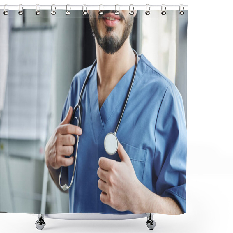 Personality  Cropped View Of Positive Bearded Doctor In Blue Uniform Touching Stethoscope On Neck While Standing In Training Room, First Aid Training Seminar And Emergency Preparedness Concept Shower Curtains