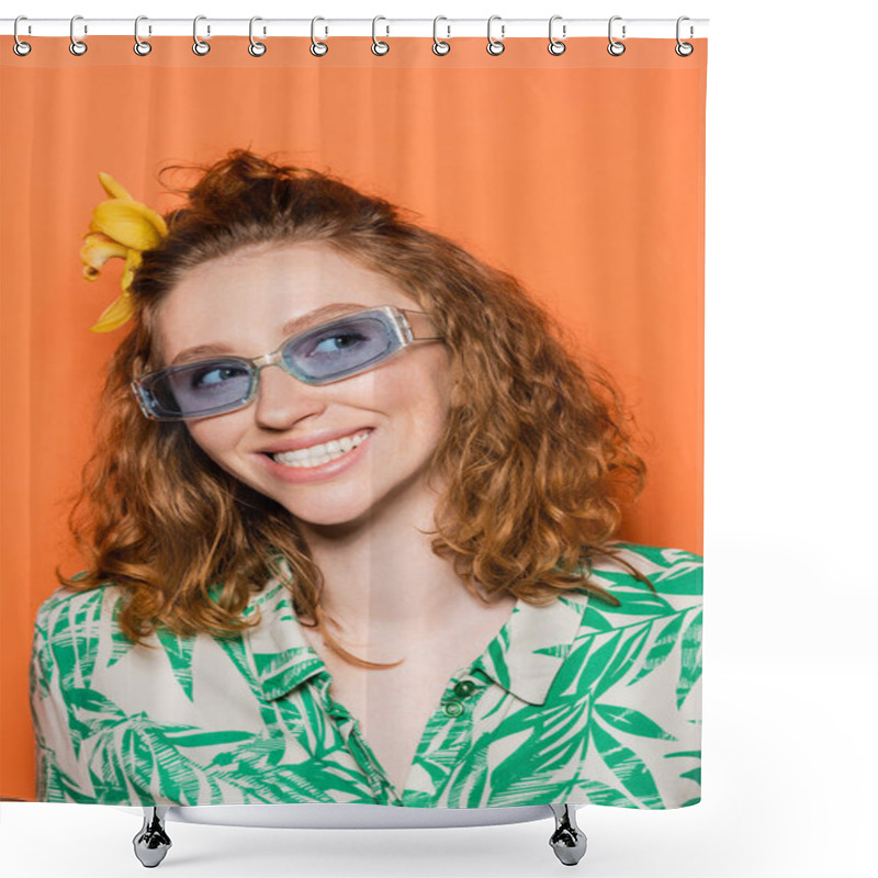 Personality  Portrait Of Joyful Young Redhead Woman With Orchid Flower In Hair And Blue Sunglasses Looking Away And Standing On Orange Background, Summer Casual And Fashion Concept  Shower Curtains