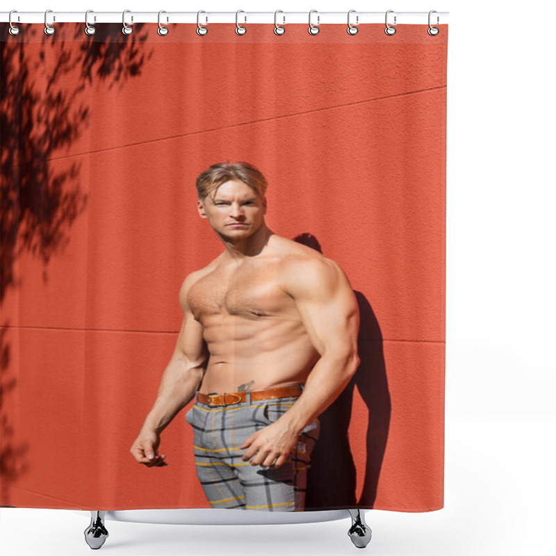 Personality  A Shirtless, Muscular Blonde Man With A Defined Physique Poses Against A Red Wall While Wearing Plaid Pants. Shower Curtains