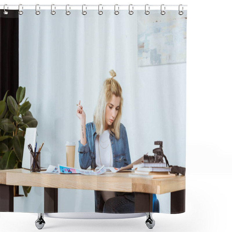 Personality  Portrait Of Thoughtful Photographer Looking At Photoshoot Examples At Workplace In Office Shower Curtains