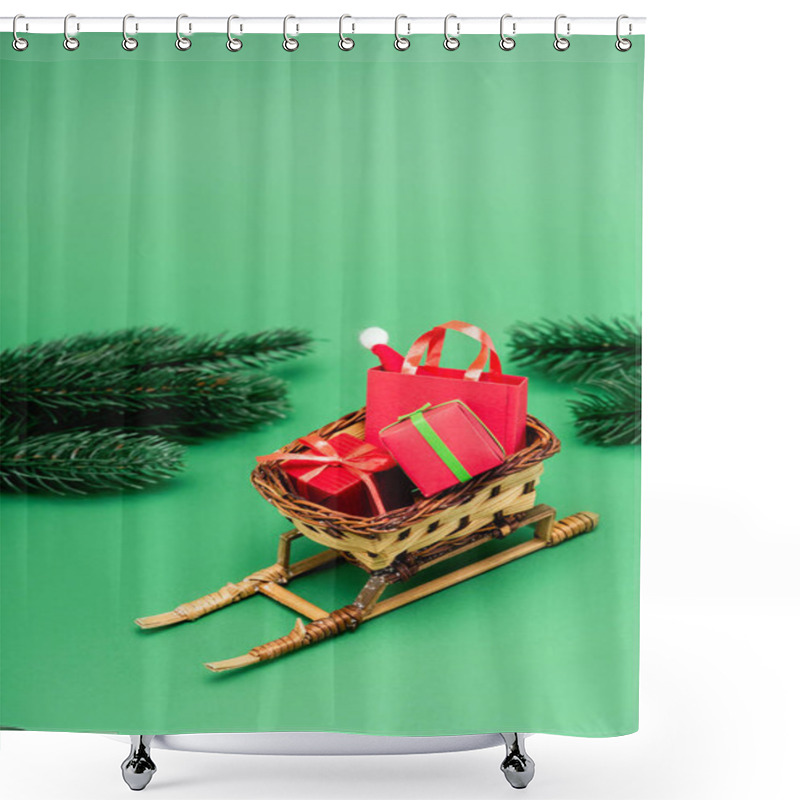 Personality  Gift Boxes And Shopping Bag With Santa Hat In Wicker Basket On Decorative Sleigh Near Fir Branches On Green Shower Curtains