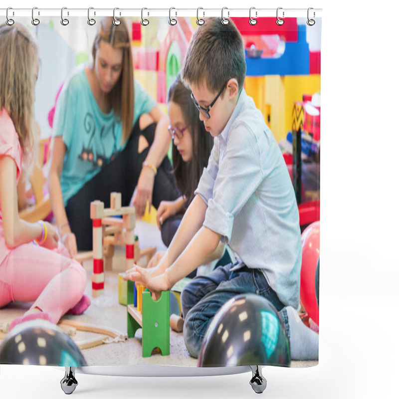 Personality  Cute Pre-school Boy Cooperating With His Colleagues At The Construction Of A Structure Made Of Wooden Toy Blocks, Under The Guidance Of A Young Kindergarten Teacher Shower Curtains