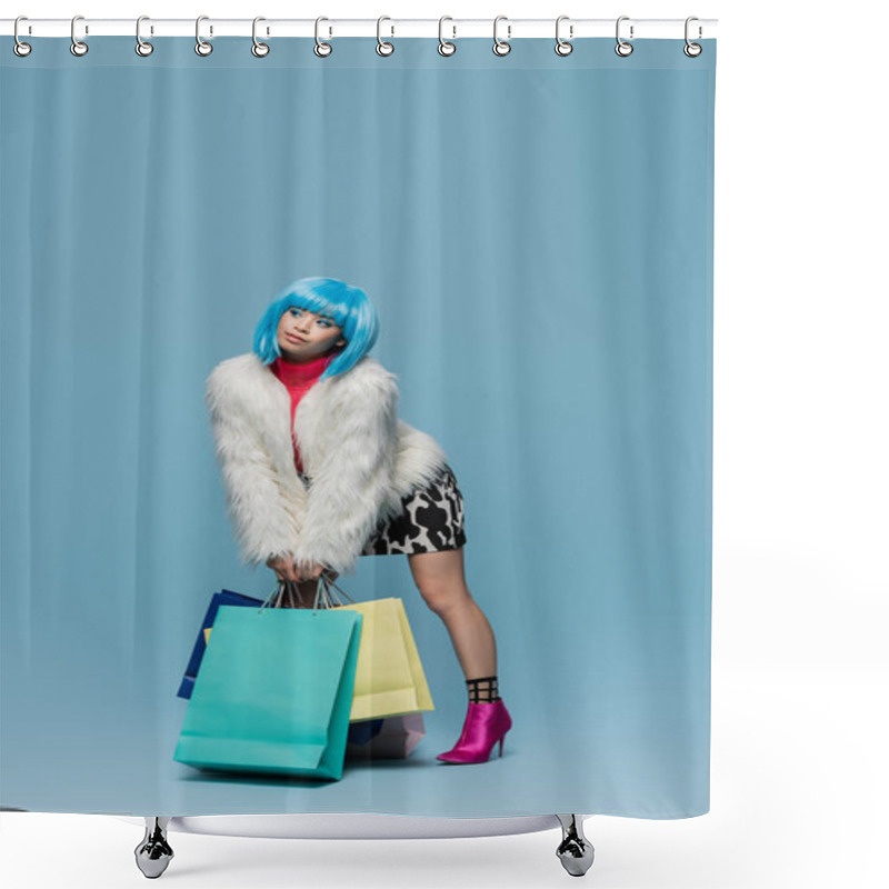 Personality  Trendy Asian Woman In Fluffy Jacket Holding Shopping Bags On Blue Background  Shower Curtains